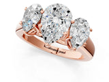 Rose gold Pear Three-Stone Diamond Ring with Prong Setting on a Classic Band_16