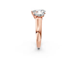 Rose gold Pear Three-Stone Diamond Ring with Prong Setting on a Classic Band_17