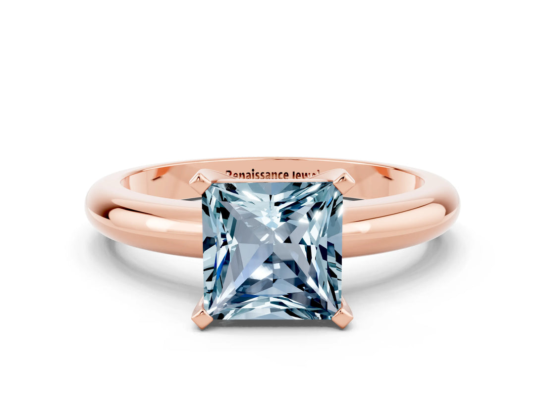 Rose gold Princess Cut Aquamarine Solitaire Engagement Ring with Round Band and Four-Prong Setting