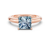 Rose gold Princess Cut Aquamarine Solitaire Engagement Ring with Round Band and Four-Prong Setting
