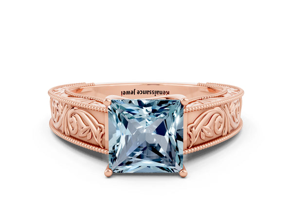 Rose gold Princess Cut Aquamarine Solitaire Ring with Engraved Band and Four-Prong Setting