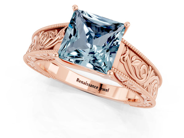 Rose gold Princess Cut Aquamarine Solitaire Ring with Engraved Band and Four-Prong Setting
