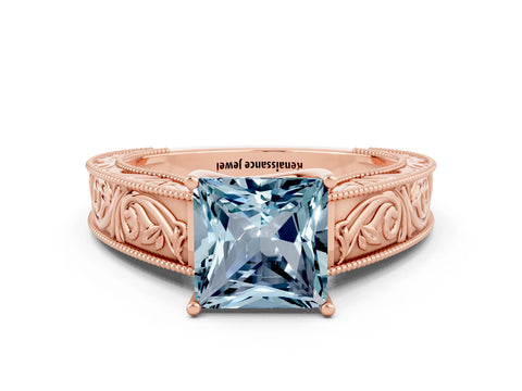Rose gold Princess Cut Aquamarine Solitaire Ring with Engraved Band and Four-Prong Setting