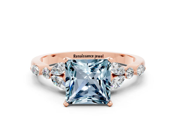 Rose gold Princess Cut Aquamarine Solitaire Ring with Side Stones and Four-Prong Setting