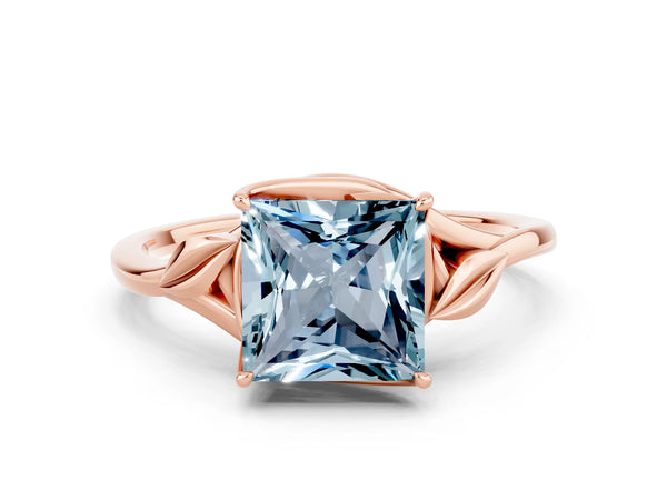 Rose gold Princess Cut Aquamarine Solitaire Ring with Twist Band and Four-Prong Setting