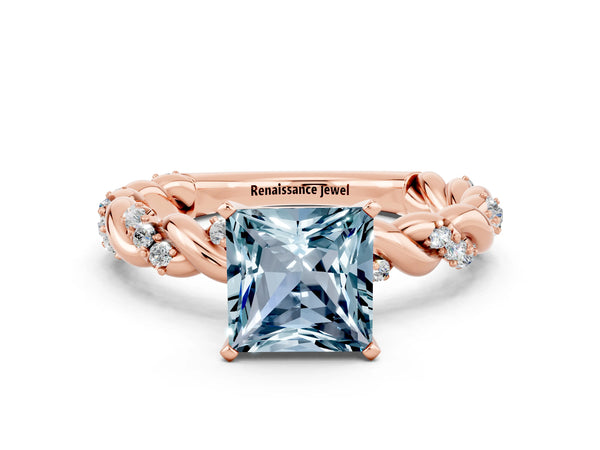 Rose gold Princess Cut Aquamarine Solitaire Ring with Twisted Band and Pavé Accents