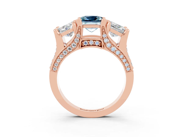 Rose gold Princess Cut Aquamarine Three-Stone Ring with Channel Set Band and Four-Prong Setting