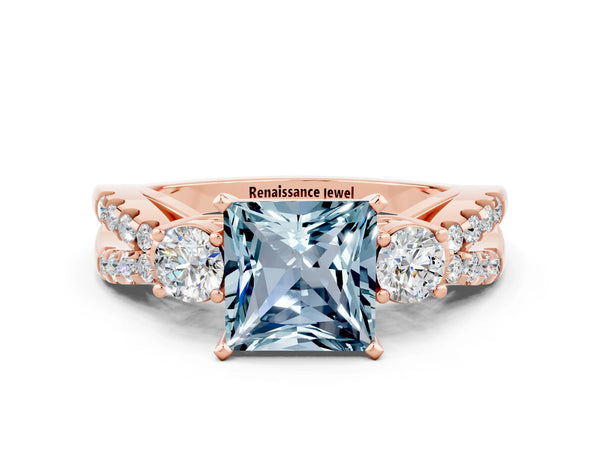 Rose gold Princess Cut Aquamarine Three-Stone Ring with Pavé Split Shank and Four-Prong Setting