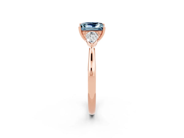 Rose gold Princess Cut Aquamarine Three-Stone Ring with Pear  Side Stones and Prong Setting