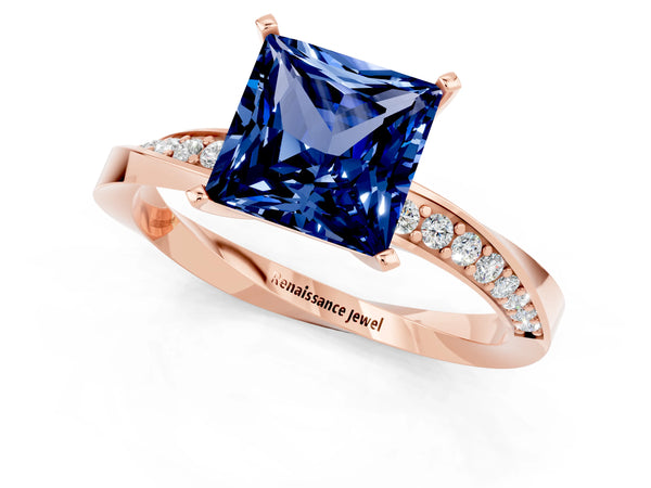 Rose gold Princess Cut Blue Sapphire Engagement Ring with Side Stone Accents and Four-Prong Setting