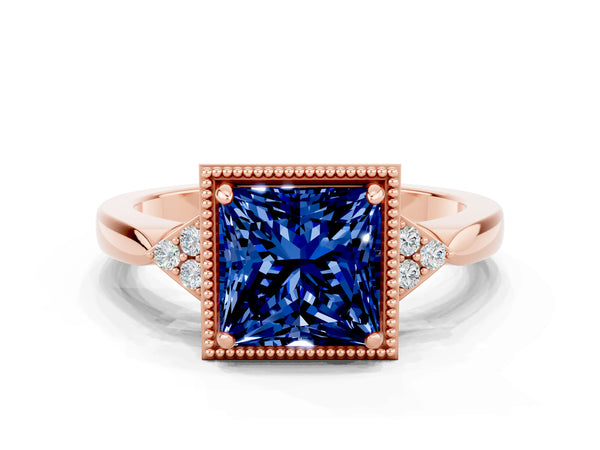 Rose gold Princess Cut Blue Sapphire Halo Ring with Tapered Band and Four-Prong Setting