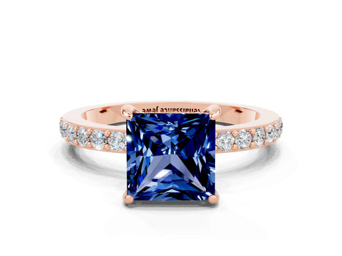 Rose gold Princess Cut Blue Sapphire Ring with Pavé Band and Four-Prong Setting