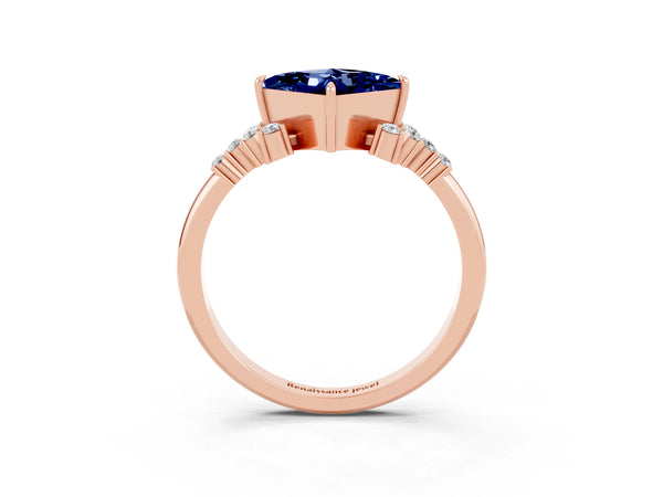 Rose gold Princess Cut Blue Sapphire Ring with Side Stones and Four-Prong Setting