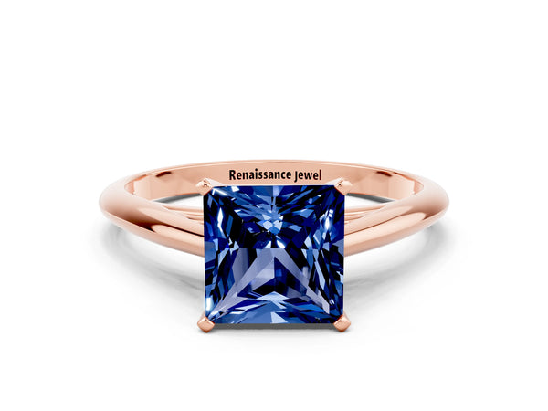 Rose gold Princess Cut Blue Sapphire Solitaire Engagement Ring with Cathedral Setting and Four-Prong Mount