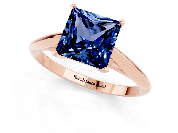 Rose gold Princess Cut Blue Sapphire Solitaire Engagement Ring with Cathedral Setting and Four-Prong Mount