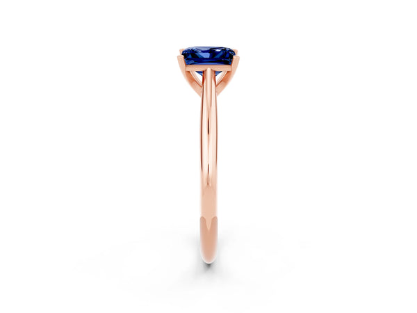 Rose gold Princess Cut Blue Sapphire Solitaire Engagement Ring with Cathedral Setting and Four-Prong Mount