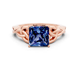 Rose gold Princess Cut Blue Sapphire Solitaire Engagement Ring with Celtic Knot Band and Four-Prong Setting