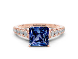 Rose gold Princess Cut Blue Sapphire Solitaire Ring with Cathedral Setting and Pavé Band