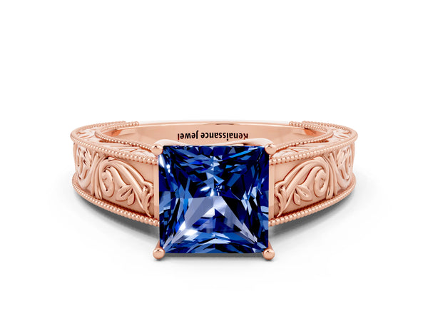 Rose gold Princess Cut Blue Sapphire Solitaire Ring with Engraved Band and Four-Prong Setting