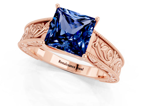 Rose gold Princess Cut Blue Sapphire Solitaire Ring with Engraved Band and Four-Prong Setting_1
