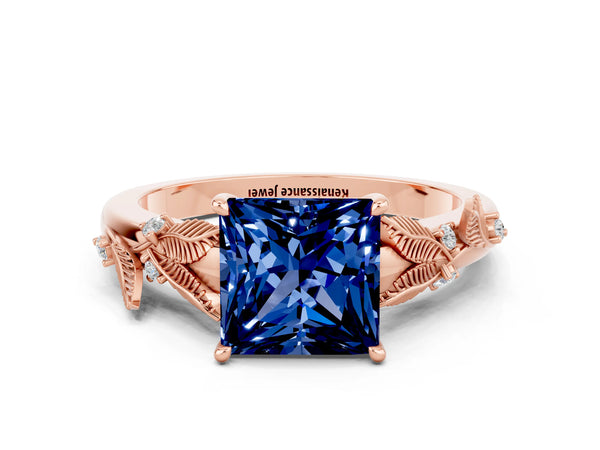 Rose gold Princess Cut Blue Sapphire Solitaire Ring with Leaf Motif Band and Four-Prong Setting