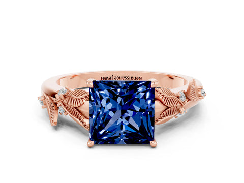 Rose gold Princess Cut Blue Sapphire Solitaire Ring with Leaf Motif Band and Four-Prong Setting