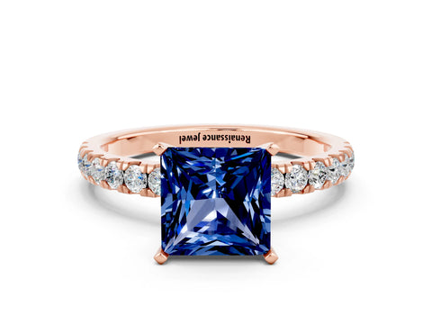 Rose gold Princess Cut Blue Sapphire Solitaire Ring with Pavé Accents and Four-Prong Setting