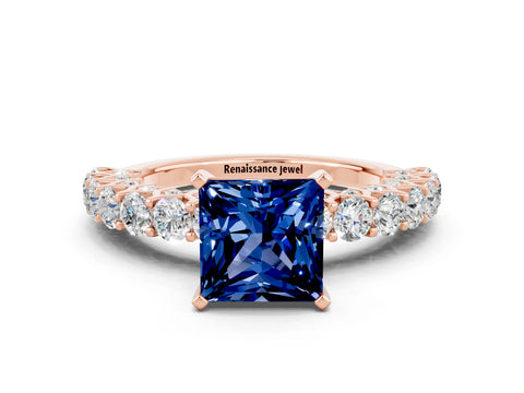 Rose gold Princess Cut Blue Sapphire Solitaire Ring with Shared Prong Pavé Band and Four-Prong Setting