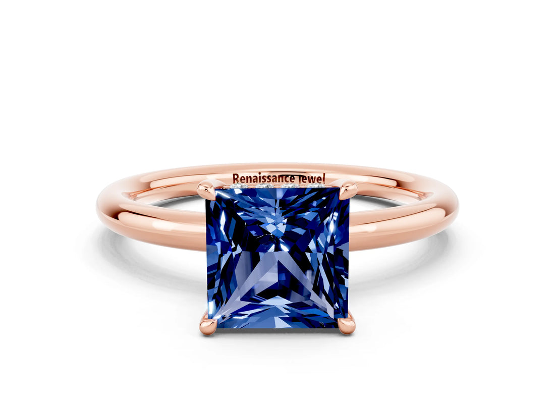 Rose gold Princess Cut Blue Sapphire Solitaire Ring with Thin Band and Four-Prong Setting