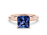 Rose gold Princess Cut Blue Sapphire Solitaire Ring with Thin Band and Four-Prong Setting