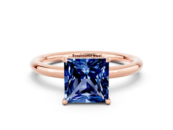 Rose gold Princess Cut Blue Sapphire Solitaire Ring with Thin Band and Four-Prong Setting