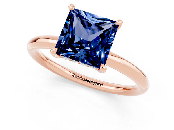 Rose gold Princess Cut Blue Sapphire Solitaire Ring with Thin Band and Four-Prong Setting