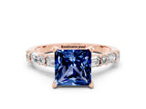 Rose gold Princess Cut Blue Sapphire Solitaire with Side Baguettes and Channel Set Band