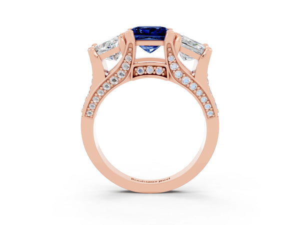 Rose gold Princess Cut Blue Sapphire Three-Stone Ring with Channel Set Band and Four-Prong Setting