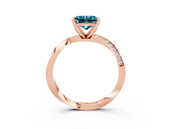 Rose gold Princess Cut Blue Topaz Engagement Ring with Side Stone Accents and Four-Prong Setting