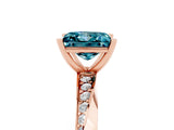 Rose gold Princess Cut Blue Topaz Engagement Ring with Side Stone Accents and Four-Prong Setting_65