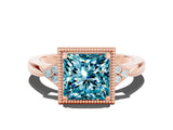 Rose gold Princess Cut Blue Topaz Halo Ring with Tapered Band and Four-Prong Setting