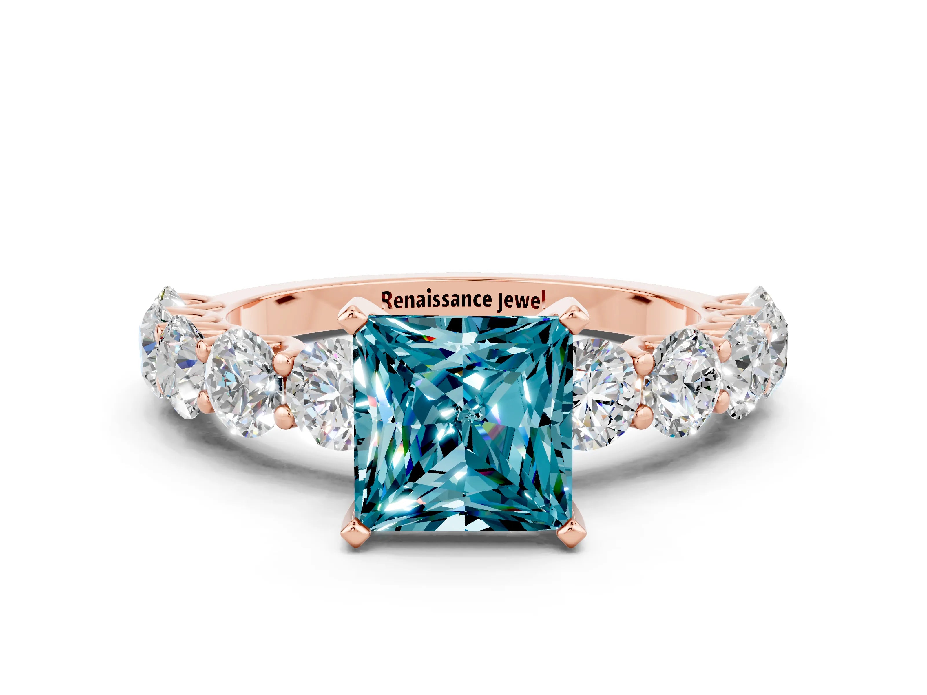 Rose gold Princess Cut Blue Topaz Prong Setting with Side Stones on a Pave Band