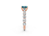 Rose gold Princess Cut Blue Topaz Prong Setting with Side Stones on a Pave Band_2
