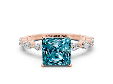 Rose gold Princess Cut Blue Topaz Ring with Marquise Side Stones and Prong Setting