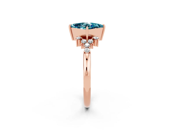 Rose gold Princess Cut Blue Topaz Ring with Side Stones and Four-Prong Setting