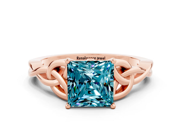 Rose gold Princess Cut Blue Topaz Solitaire Engagement Ring with Celtic Knot Band and Four-Prong Setting