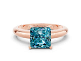 Rose gold Princess Cut Blue Topaz Solitaire Engagement Ring with Round Band and Four-Prong Setting