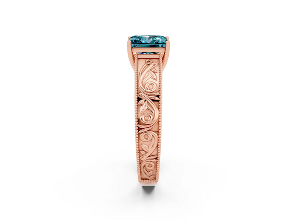 Rose gold Princess Cut Blue Topaz Solitaire Ring with Engraved Band and Four-Prong Setting