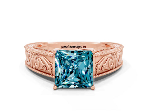Rose gold Princess Cut Blue Topaz Solitaire Ring with Engraved Band and Four-Prong Setting
