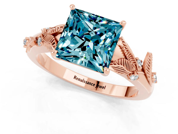 Rose gold Princess Cut Blue Topaz Solitaire Ring with Leaf Motif Band and Four-Prong Setting