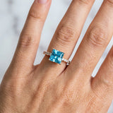 Rose gold Princess Cut Blue Topaz Solitaire Ring with Round  Pavé Band and Four-Prong Setting_54