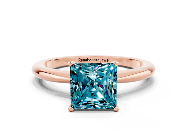 Rose gold Princess Cut Blue Topaz Solitaire Ring with Six-Prong Setting and Classic Band
