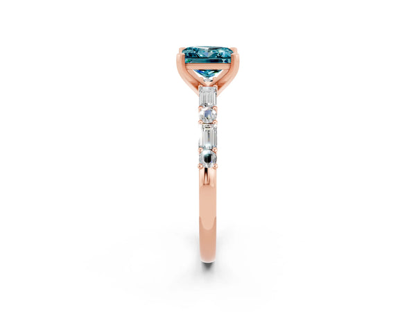 Rose gold Princess Cut Blue Topaz Solitaire with Side Baguettes and Channel Set Band