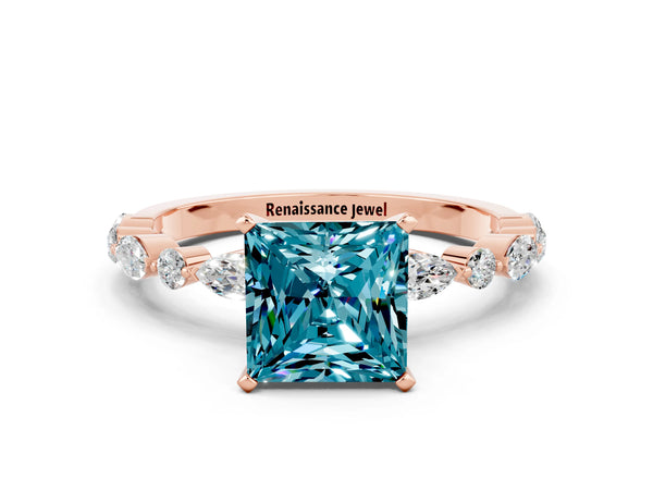 Rose gold Princess Cut Blue Topaz Ring with Marquise and Round  Side Stones and Four-Prong Setting